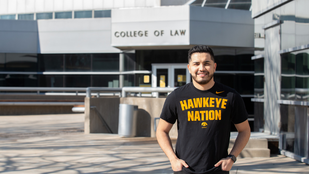 Eddie Ponce, Class of 2021, in front of the Boyd Law Building